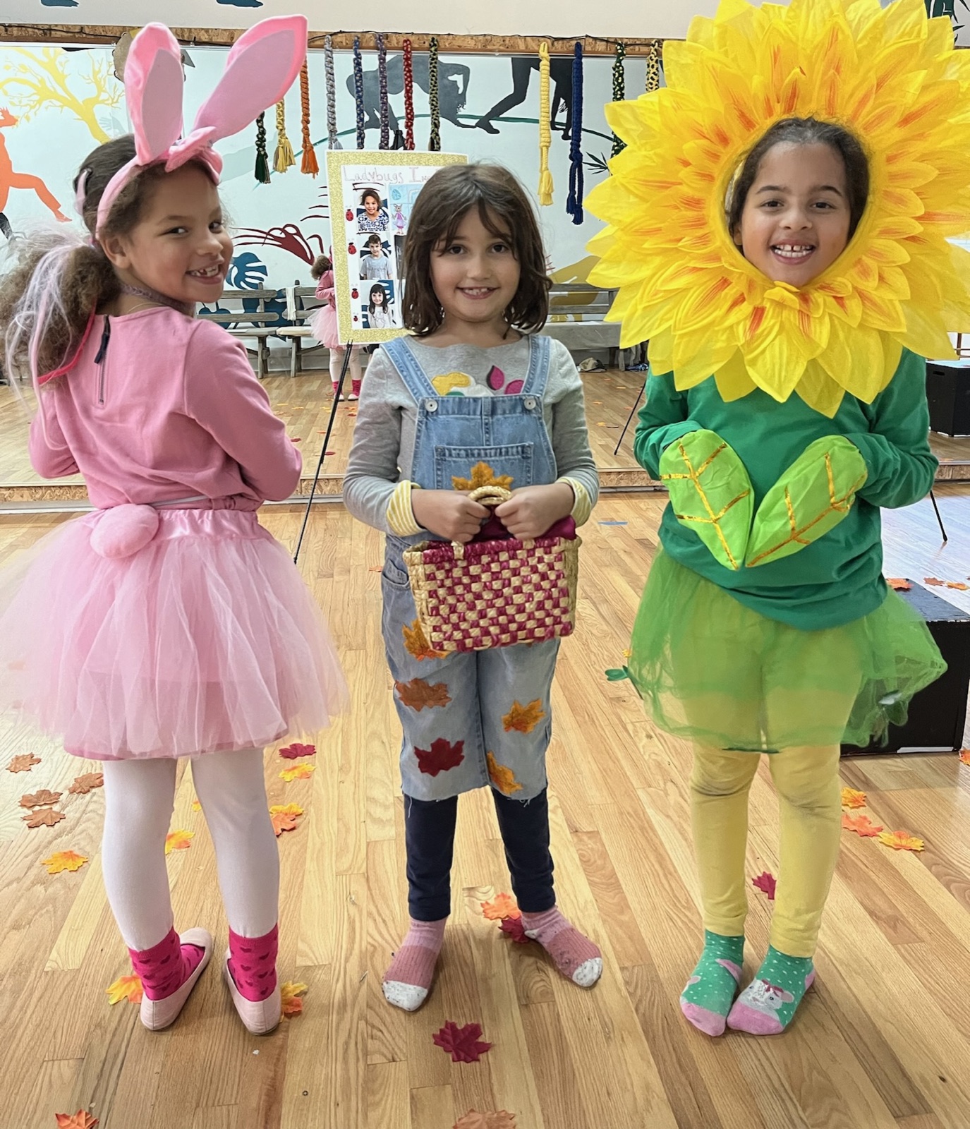 Young performers in costume at a Ladybug Arts show